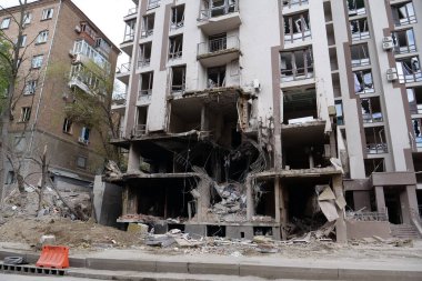 KYIV, UKRAINE, APRIL 29, 2022: After bombing. Dwelling house destroyed by russian missile in Kyiv city on end of April 2022. Russian aggression. War in Ukraine. Terror and genocide of Ukrainian people