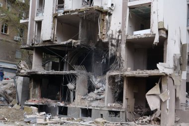 KYIV, UKRAINE, APRIL 29, 2022: After bombing. Dwelling house destroyed by russian missile in Kyiv city on end of April 2022. Russian aggression. War in Ukraine. Terror and genocide of Ukrainian people