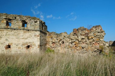 Stone tower in Pniv Castle - medieval historical object in Ivano-Frankivsk region of western Ukraine
