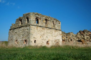 Stone tower in Pniv Castle - medieval historical object in Ivano-Frankivsk region of western Ukraine