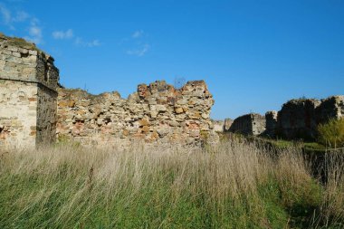 Stone tower in Pniv Castle - medieval historical object in Ivano-Frankivsk region of western Ukraine