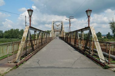Old metal bridge across the Dniester river in the city of Galich or Halych, western Ukraine