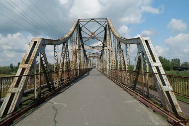 Old metal bridge across the Dniester river in the city of Galich or Halych, western Ukraine