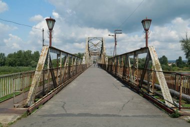 Old metal bridge across the Dniester river in the city of Galich or Halych, western Ukraine