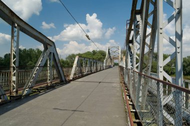 Old metal bridge across the Dniester river in the city of Galich or Halych, western Ukraine