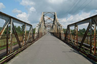 Old metal bridge across the Dniester river in the city of Galich or Halych, western Ukraine