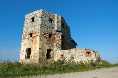 Stone tower in Pniv Castle - medieval historical object in Ivano-Frankivsk region of western Ukraine
