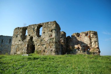 Stone ruins in Pniv Castle - medieval historical object in Ivano-Frankivsk region of western Ukraine