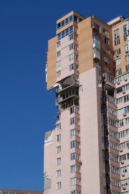 KYIV, UKRAINE, MAY 11, 2022: After bombing. War in Ukraine. Terror and genocide of Ukrainian people. Russian terrorists damaged by missile dwelling house in Kyiv on end of February 2022