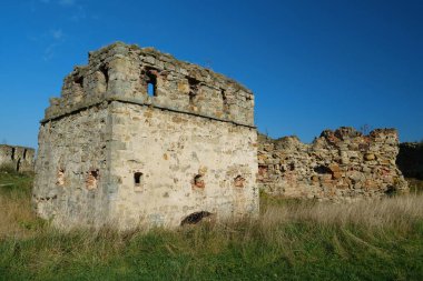 Stone tower in Pniv Castle - medieval historical object in Ivano-Frankivsk region of western Ukraine