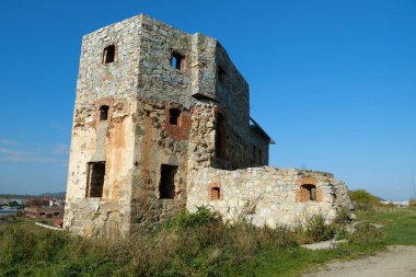 Stone tower in Pniv Castle - medieval historical object in Ivano-Frankivsk region of western Ukraine