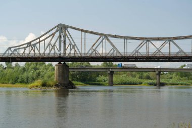 Old metal bridge across the Dniester river in the city of Galich or Halych, western Ukraine