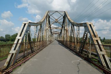 Old metal bridge across the Dniester river in the city of Galich or Halych, western Ukraine