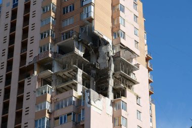 KYIV, UKRAINE, MAY 11, 2022: Russian missile damaged multi-storey dwelling building in Kiev city on February 26, 2022. Russian aggression. War in Ukraine. Terror and genocide of Ukrainian people