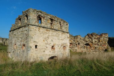 Stone tower in Pniv Castle - medieval historical object in Ivano-Frankivsk region of western Ukraine