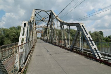 Old metal bridge across the Dniester river in the city of Galich or Halych, western Ukraine