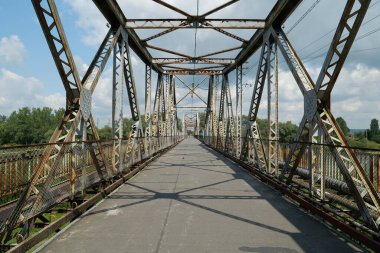 Old metal bridge across the Dniester river in the city of Galich or Halych, western Ukraine