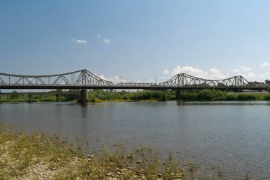 Old metal bridge across the Dniester river in the city of Galich or Halych, western Ukraine