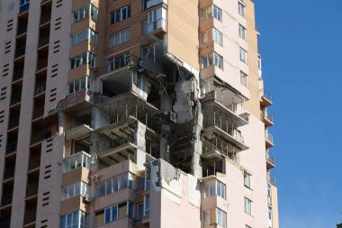 KYIV, UKRAINE, MAY 11, 2022: Russian missile damaged multi-storey dwelling building in Kiev city on February 26, 2022. Russian aggression. War in Ukraine. Terror and genocide of Ukrainian people