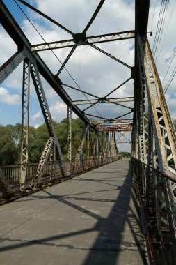 Old metal bridge across the Dniester river in the city of Galich or Halych, western Ukraine
