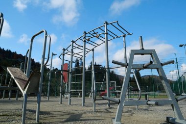 Sports ground for physical exercise on open air. Sports ground with exercise equipment in open air sport zone