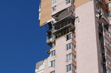 KYIV, UKRAINE, MAY 11, 2022: Russian missile damaged multi-storey dwelling building in Kiev city on February 26, 2022. Russian aggression. War in Ukraine. Terror and genocide of Ukrainian people