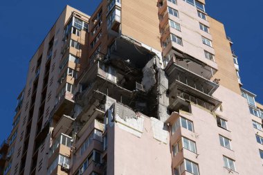 KYIV, UKRAINE, MAY 11, 2022: Russian missile damaged multi-storey dwelling building in Kiev city on February 26, 2022. Russian aggression. War in Ukraine. Terror and genocide of Ukrainian people
