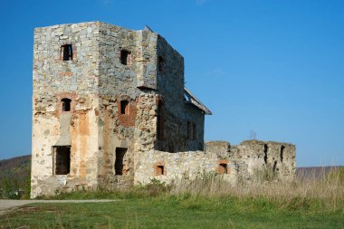 Ancient stone tower, turret in Pniv Castle - medieval historical object in Ivano-Frankivsk region of western Ukraine