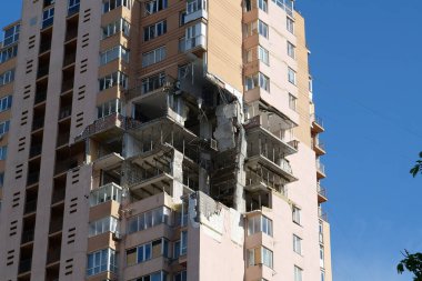 KYIV, UKRAINE, MAY 11, 2022: Russian missile damaged multi-storey dwelling building in Kiev city on February 26, 2022. Russian aggression. War in Ukraine. Terror and genocide of Ukrainian people
