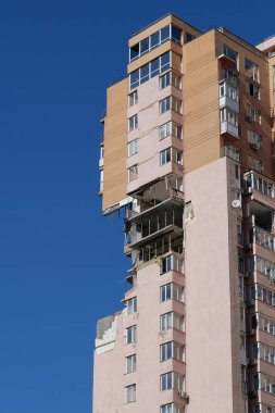 KYIV, UKRAINE, MAY 11, 2022: Russian missile damaged multi-storey dwelling building in Kiev city on February 26, 2022. Russian aggression. War in Ukraine. Terror and genocide of Ukrainian people