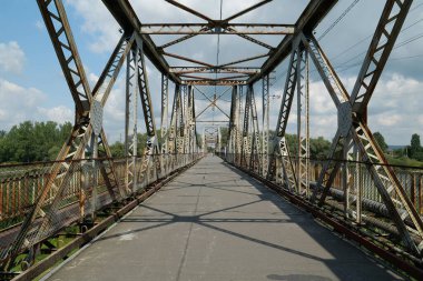 Old metal bridge across the Dniester river in the city of Galich or Halych, western Ukraine