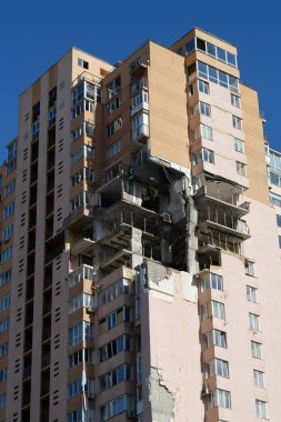 KYIV, UKRAINE, MAY 11, 2022: Russian missile damaged multi-storey dwelling building in Kiev city on February 26, 2022. Russian aggression. War in Ukraine. Terror and genocide of Ukrainian people
