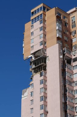 KYIV, UKRAINE, MAY 11, 2022: Russian missile damaged multi-storey dwelling building in Kiev city on February 26, 2022. Russian aggression. War in Ukraine. Terror and genocide of Ukrainian people
