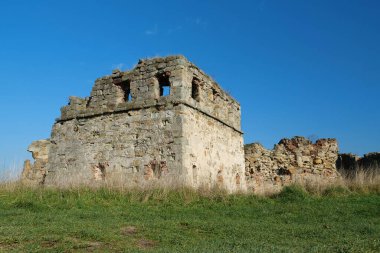 Stone ruins in Pniv Castle - medieval historical object in Ivano-Frankivsk region of western Ukraine
