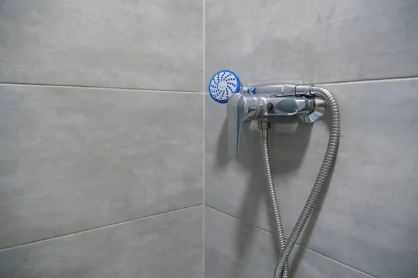 Shower Head Bathroom Chrome Faucet Grey Tiles Walls Water Flows — стоковое фото