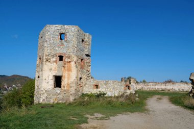 Ancient stone tower, turret in Pniv Castle - medieval historical object in Ivano-Frankivsk region of western Ukraine