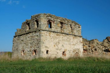Stone tower in Pniv Castle - medieval historical object in Ivano-Frankivsk region of western Ukraine