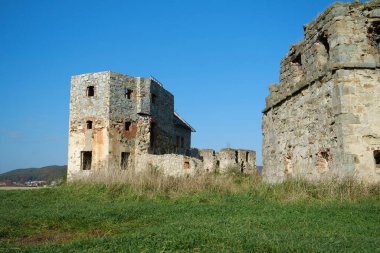 Stone tower in Pniv Castle - medieval historical object in Ivano-Frankivsk region of western Ukraine