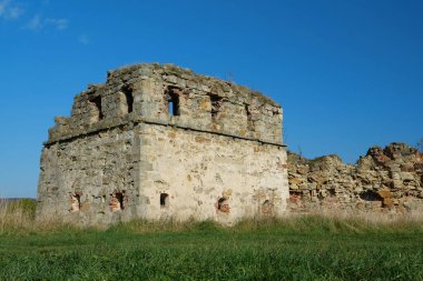 Stone tower in Pniv Castle - medieval historical object in Ivano-Frankivsk region of western Ukraine