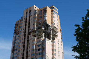 KYIV, UKRAINE, MAY 11, 2022: After bombing. War in Ukraine. Terror and genocide of Ukrainian people. Russian terrorists damaged by missile dwelling house in Kyiv on end of February 2022