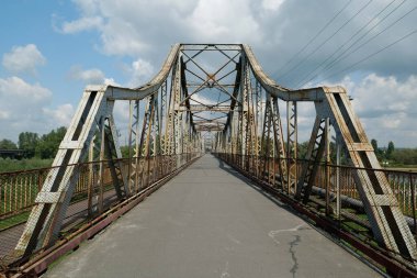 Old metal bridge across the Dniester river in the city of Galich or Halych, western Ukraine