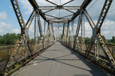 Old metal bridge across the Dniester river in the city of Galich or Halych, western Ukraine