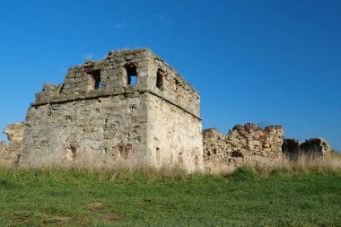 Stone ruins in Pniv Castle - medieval historical object in Ivano-Frankivsk region of western Ukraine