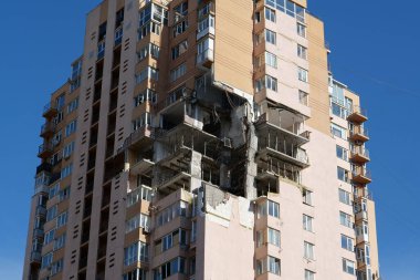 KYIV, UKRAINE, MAY 11, 2022: Russian missile damaged multi-storey dwelling building in Kiev city on February 26, 2022. Russian aggression. War in Ukraine. Terror and genocide of Ukrainian people