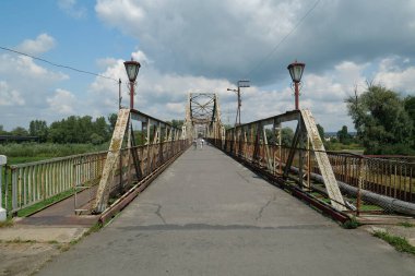 Old metal bridge across the Dniester river in the city of Galich or Halych, western Ukraine