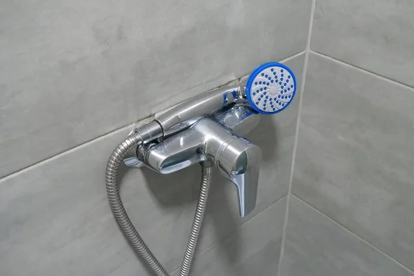 Shower Head Bathroom Chrome Faucet Grey Tiles Walls Water Flows — Zdjęcie stockowe