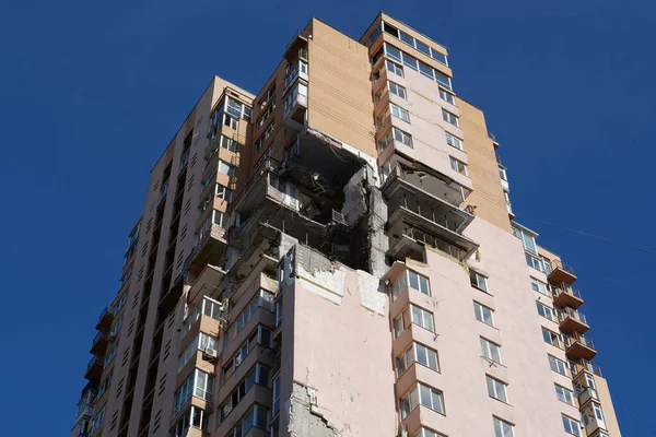KYIV, UKRAINE, MAY 11, 2022: Russian missile damaged multi-storey dwelling building in Kiev city on February 26, 2022. Russian aggression. War in Ukraine. Terror and genocide of Ukrainian people