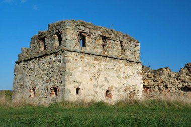 Stone tower in Pniv Castle - medieval historical object in Ivano-Frankivsk region of western Ukraine