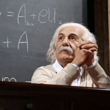 BUKOVEL, UKRAINE, OCTOBER 13, 2022: World-famous scientist, theoretical physicist, Nobel laureate, creator of theory of relativity Albert Einstein, who sits at the table