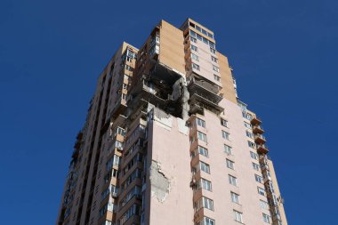 KYIV, UKRAINE, MAY 11, 2022: Russian missile damaged multi-storey dwelling building in Kiev city on February 26, 2022. Russian aggression. War in Ukraine. Terror and genocide of Ukrainian people